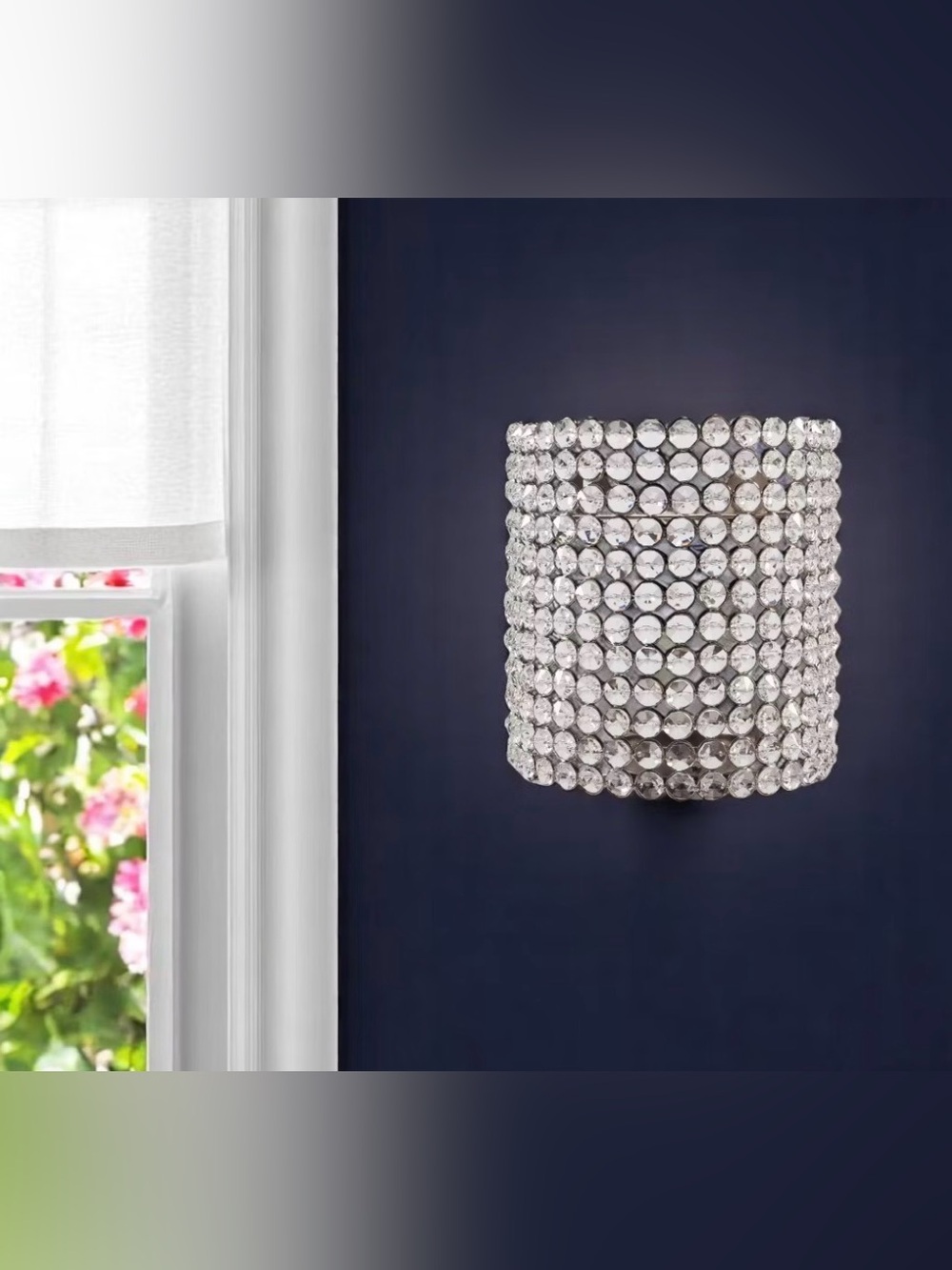 crystal wall sconce candle holder adds elegant, ambient lighting to any room.